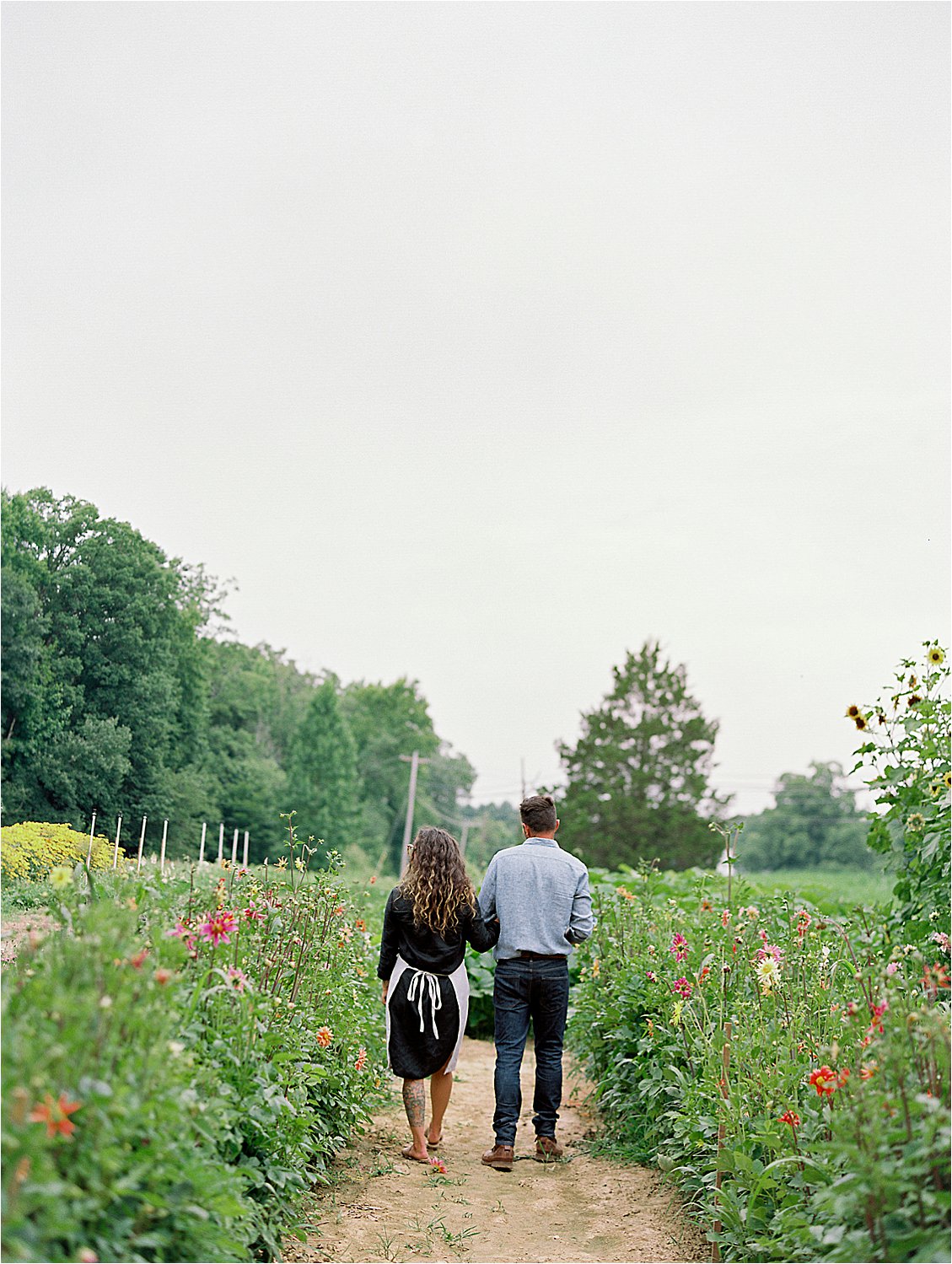 Rainy day at Loblolly Organic Farm, a floral farm just outside of DC by Destination film wedding photographer, Renee Hollingshead. DC, MD, and VA florists and designers