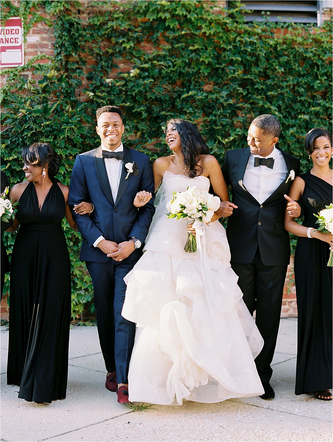 Black Bridal Party at Romantic Baltimore Museum Wedding at the American Visionary Arts Museum with Baltimore Film Wedding Photographer, Renee Hollingshead. As seen in Baltimore Weddings with Elle Ellinghaus Designs, My Flowerbox Events, White Glove Rentals, Just Write Studios and more.