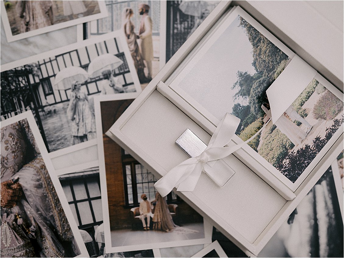 White linen box filled with fine art prints from a Pakistani Wedding by Renee Hollingshead