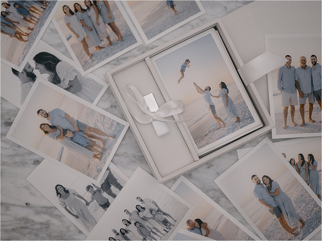 Renee Hollingshead packages up prints from a family session as a gift to her clients