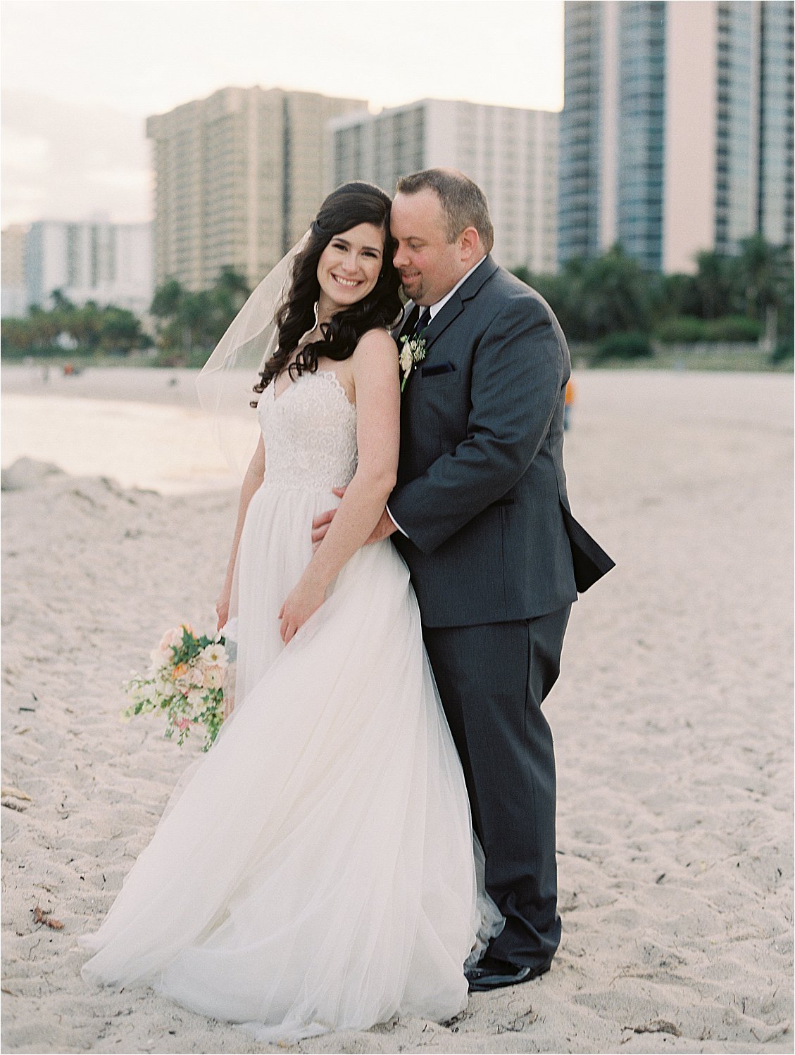 Bride + Groom Portraits at Miami Beach Edition Hotel Wedding with South Florida Film Wedding Photographer, Renee Hollingshead and Ever After Floral Design, A Touch of Beauty by Lily, Vision DJs, Watters, Nordstrom Merrick Park and more