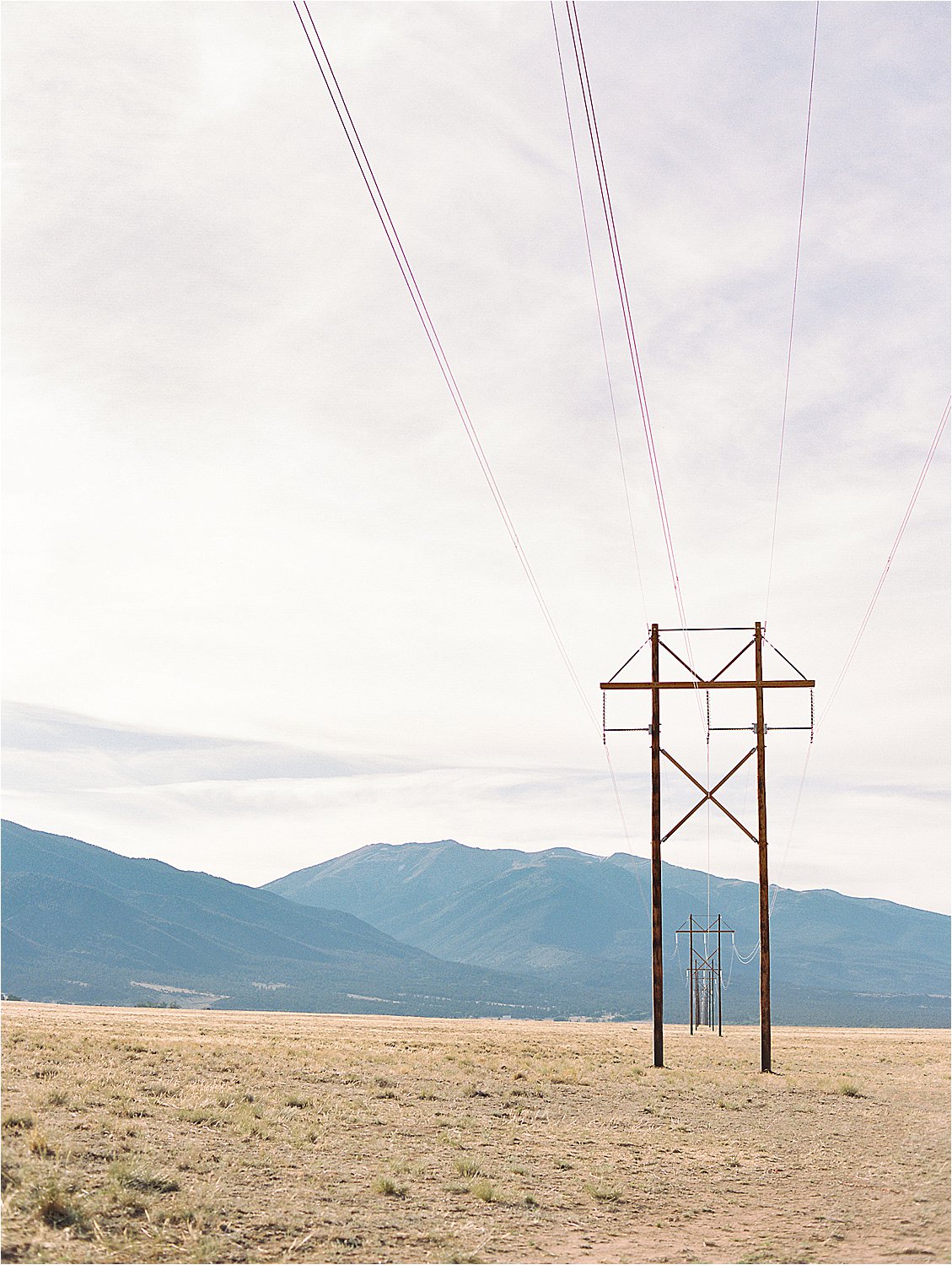 Telephone poles photographed by Destination Film Wedding Photographer, Renee Hollingshead Colorado by Destination Film Wedding Photographer, Renee Hollingshead