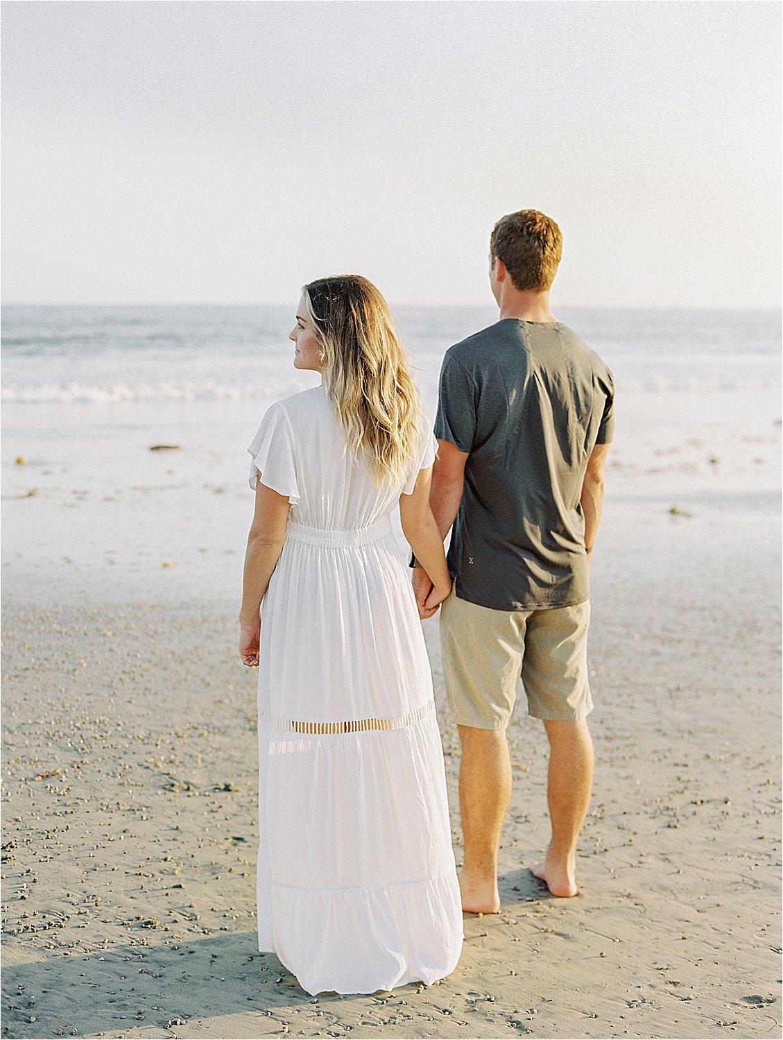 Golden Hour at Playful Coronado Island Beach Engagement Session with Southern California and Destination Film Wedding Photographer, Renee Hollingshead