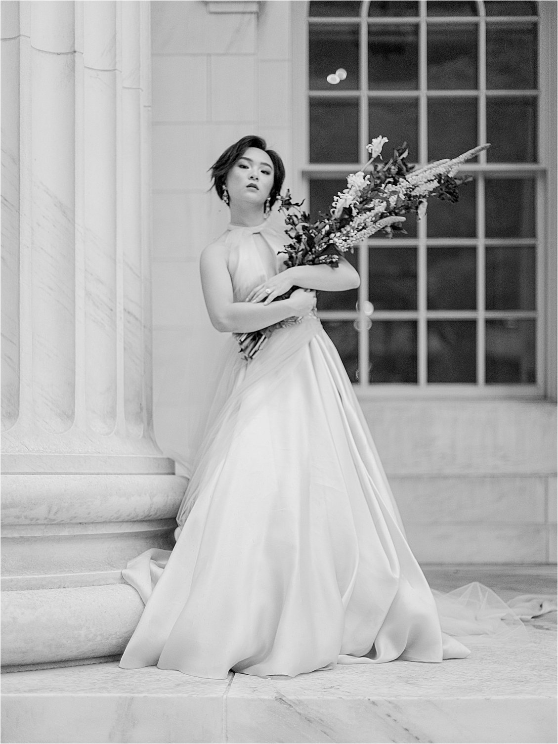 Bride walking up Marble Staircase at Denver Courthouse at Denver Winter Wedding Editorial with Destination Wedding Photographer, Renee Hollingshead
