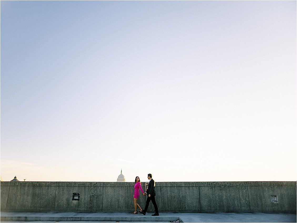 Champagne Toast at Winter DC Rooftop Engagement Session at Union Station With DC Wedding Photographer, Renee Hollingshead