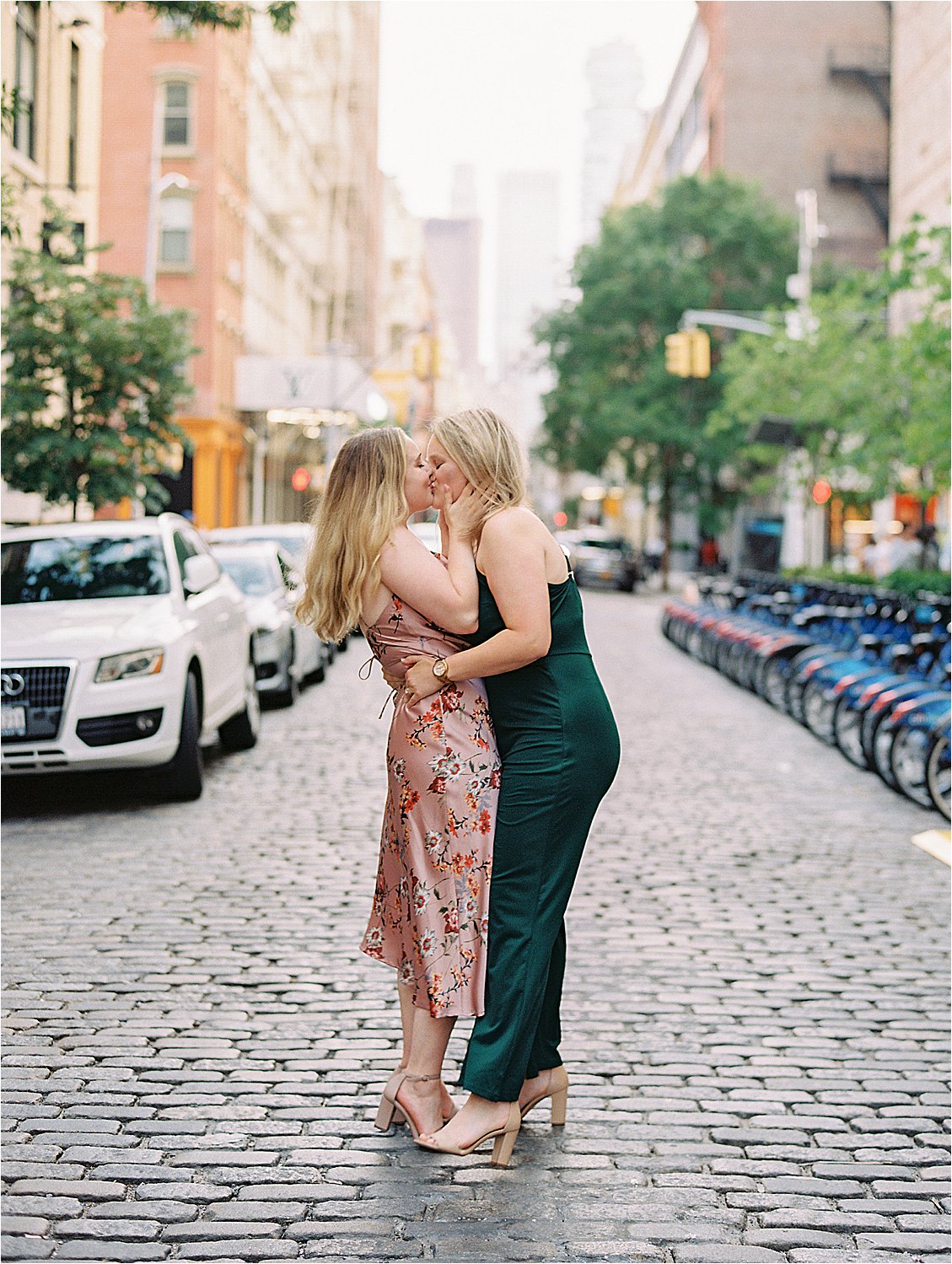 Couple kissing in the middle of the busy NYC streets on film
