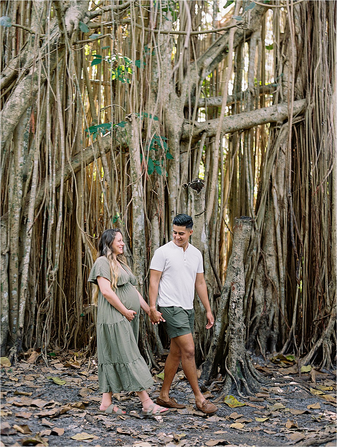 Couple walking under Banyan Tree at Tree Tops Park in Davie, Florida