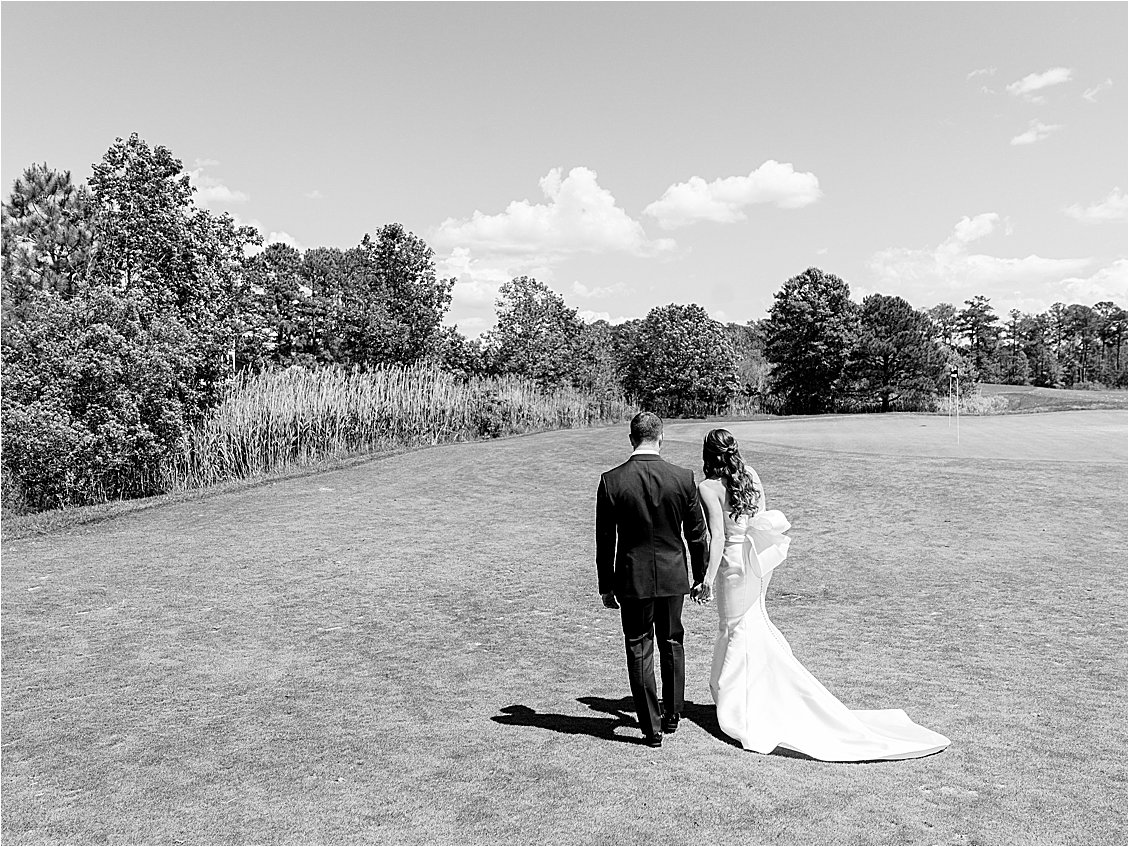 Bride and Groom on the Golf Course at Bayside Resort Wedding in Fenwick Island, Delaware
