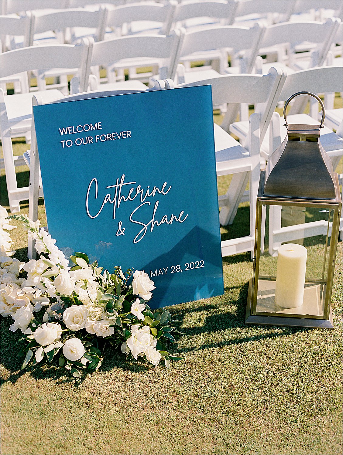 Modern Acrylic Ceremony Signage at outdoor ceremony at Bayside Resort and Golf Club in Delaware