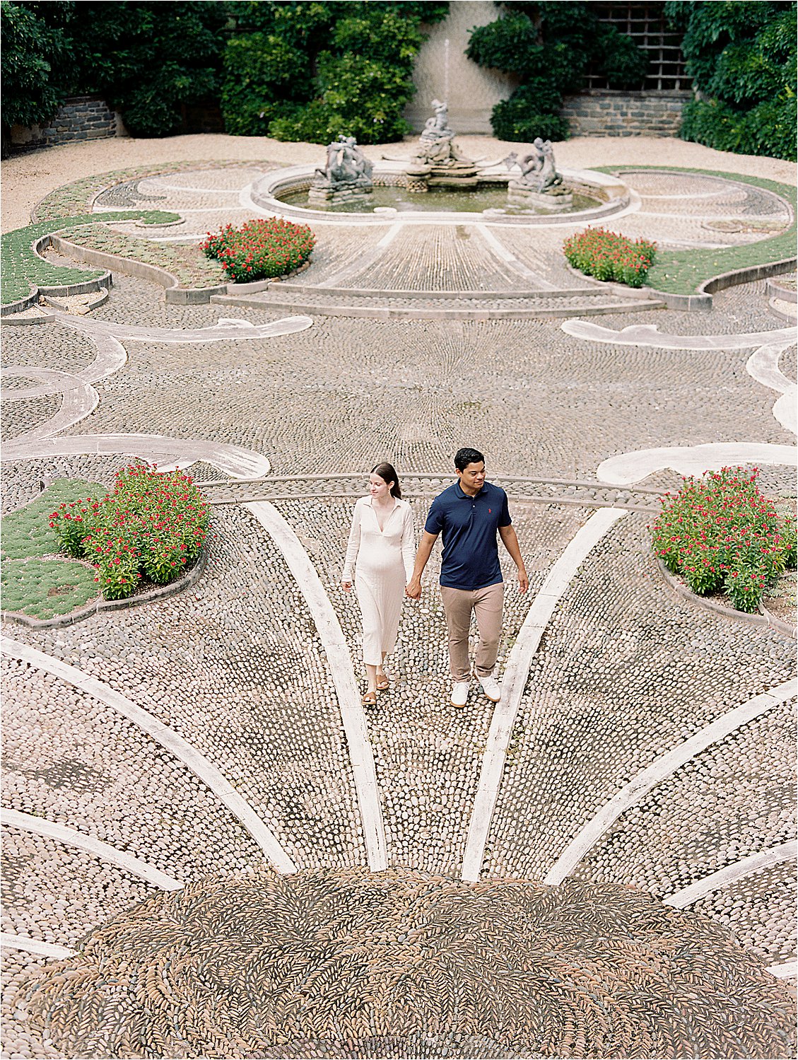 Intricate garden landscaping at summer maternity session in Washington DC