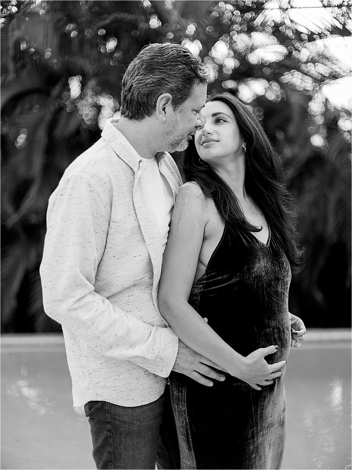 Poolside maternity session in Miami with film photographer Renee Hollingshead