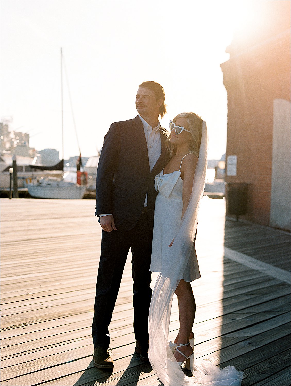 Golden hour engagement session in Fells Point with film wedding photographer, Renee Hollingshead