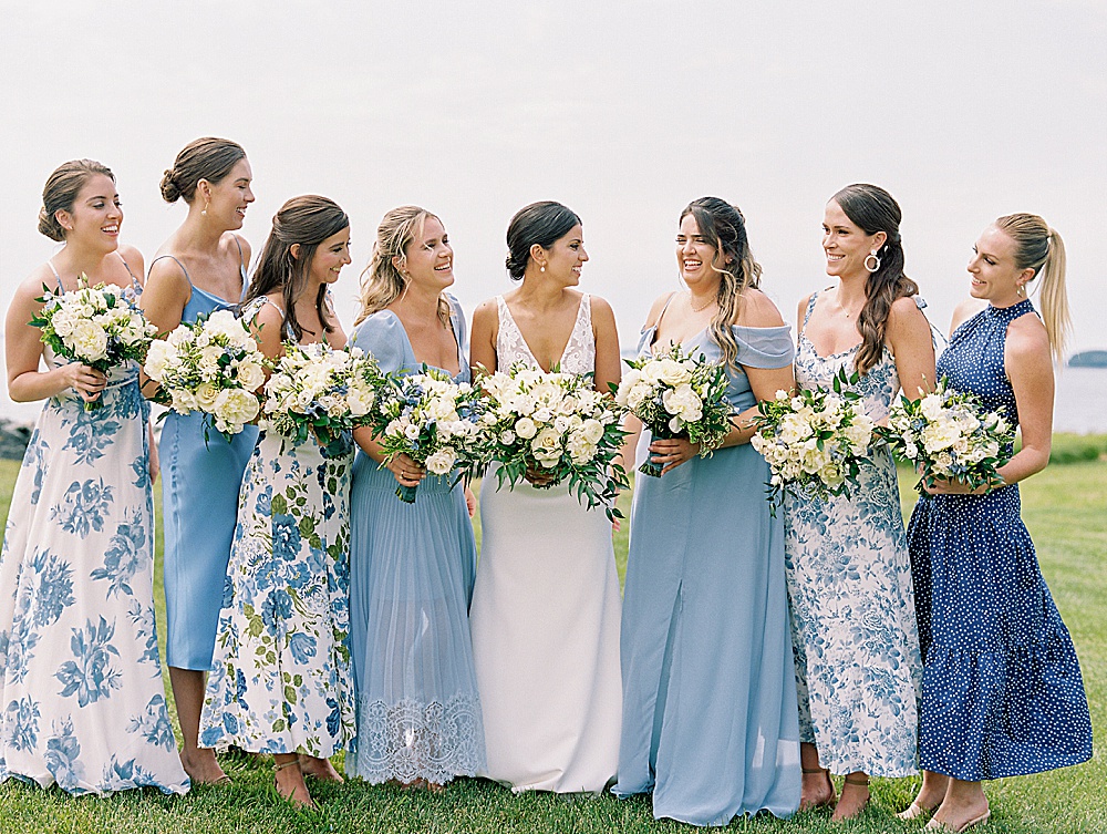 Mismatched blue bridesmaids for summer Eastern Shore Waterfront Wedding featured in Washingtonian Weddings