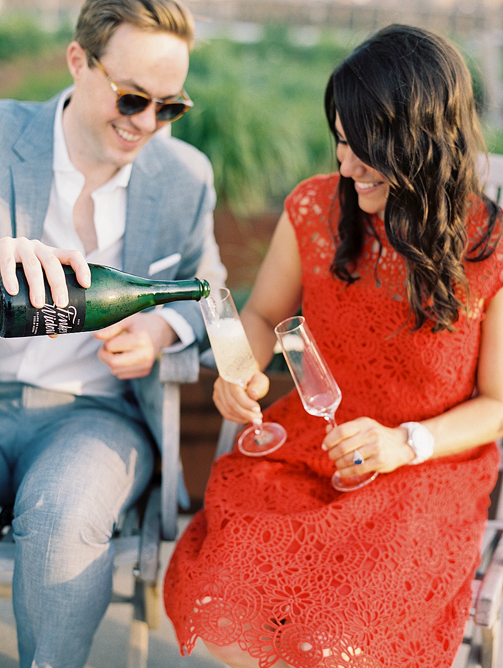 Couple toasts to their engagement on Brooklyn NYC Rooftop