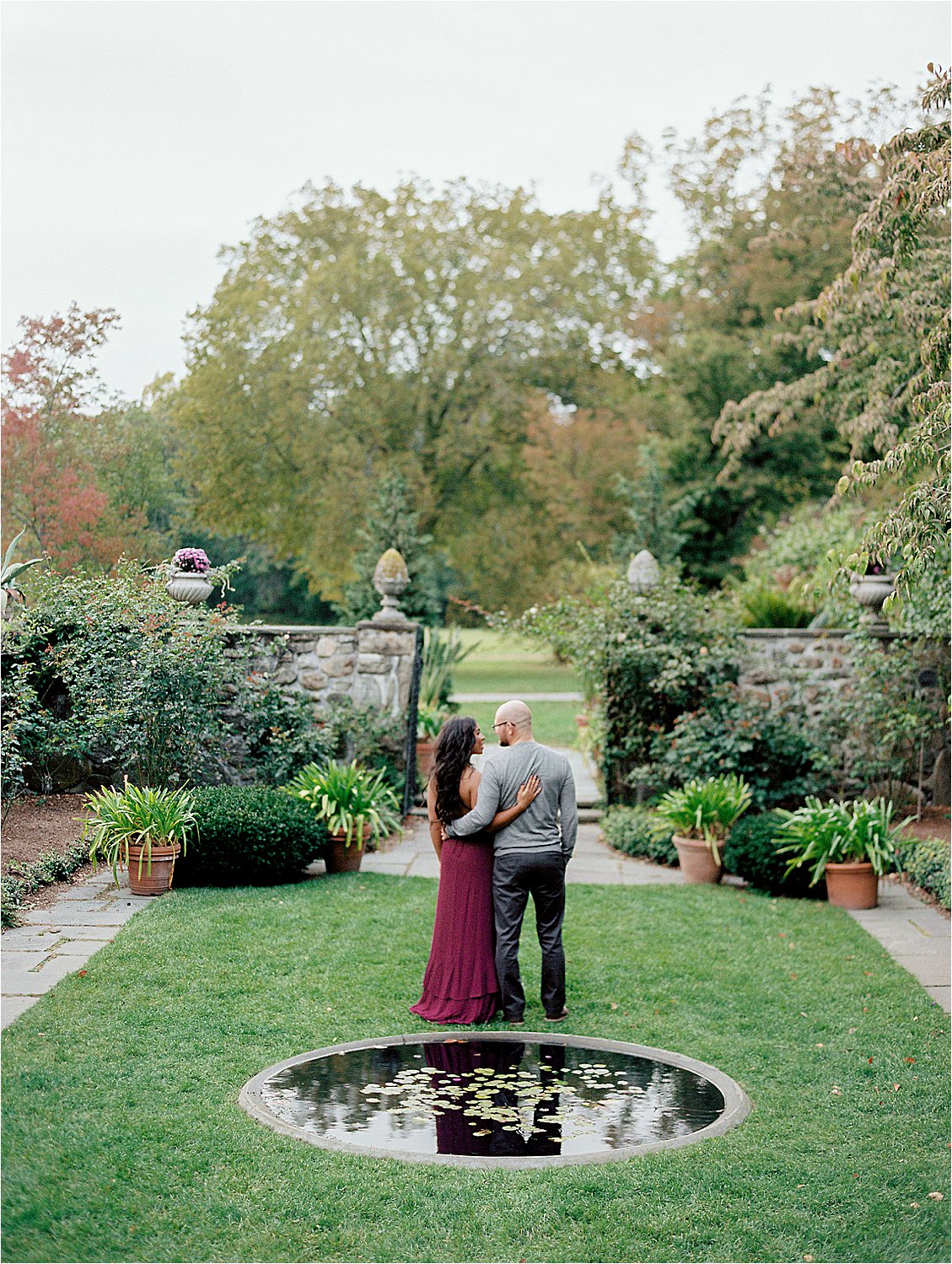 Outdoor fall Maternity session at Stevens-Coolidge House with destination film photographer Renee Hollingshead