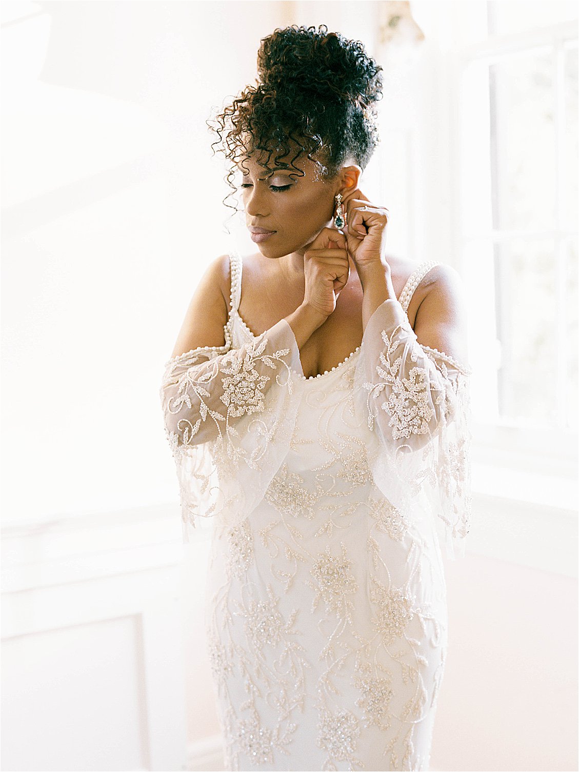 Bride in blush beaded and hand embroidered Theia Couture wedding gown photographed by DC + Destination film wedding photographer Renee Hollingshead