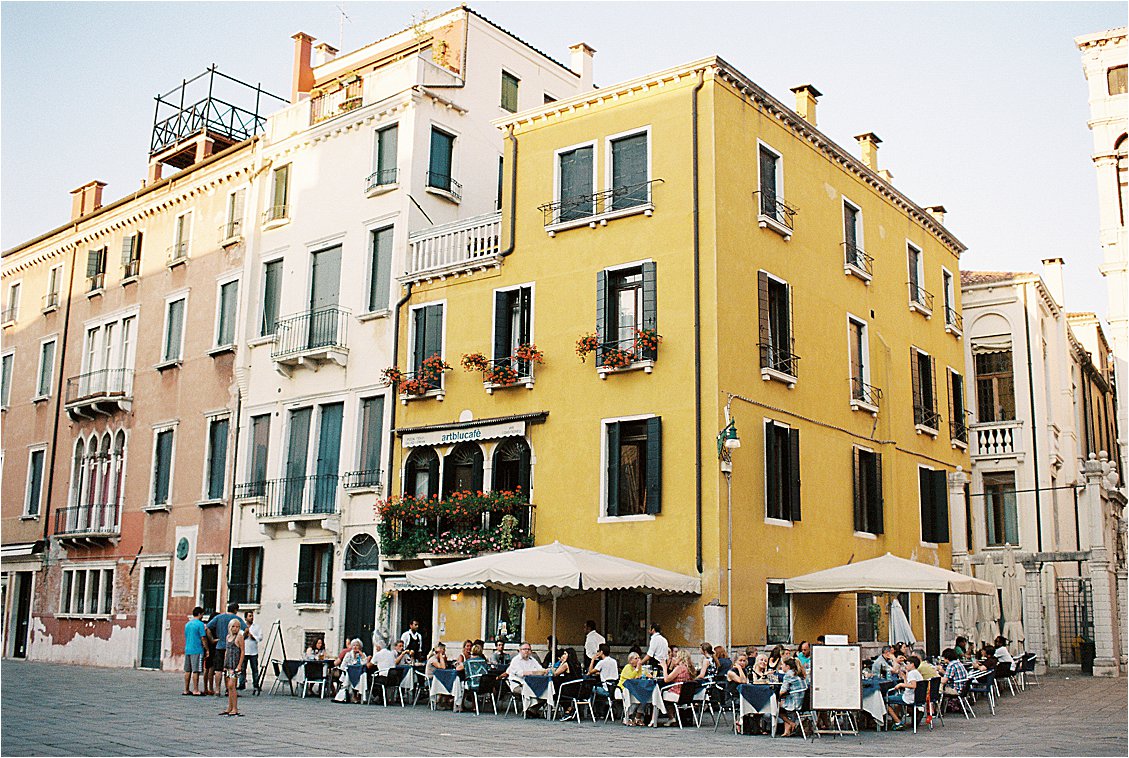 Yellow building in Venice, Italy Travel Guide on film with destination wedding photographer Renee Hollingshead