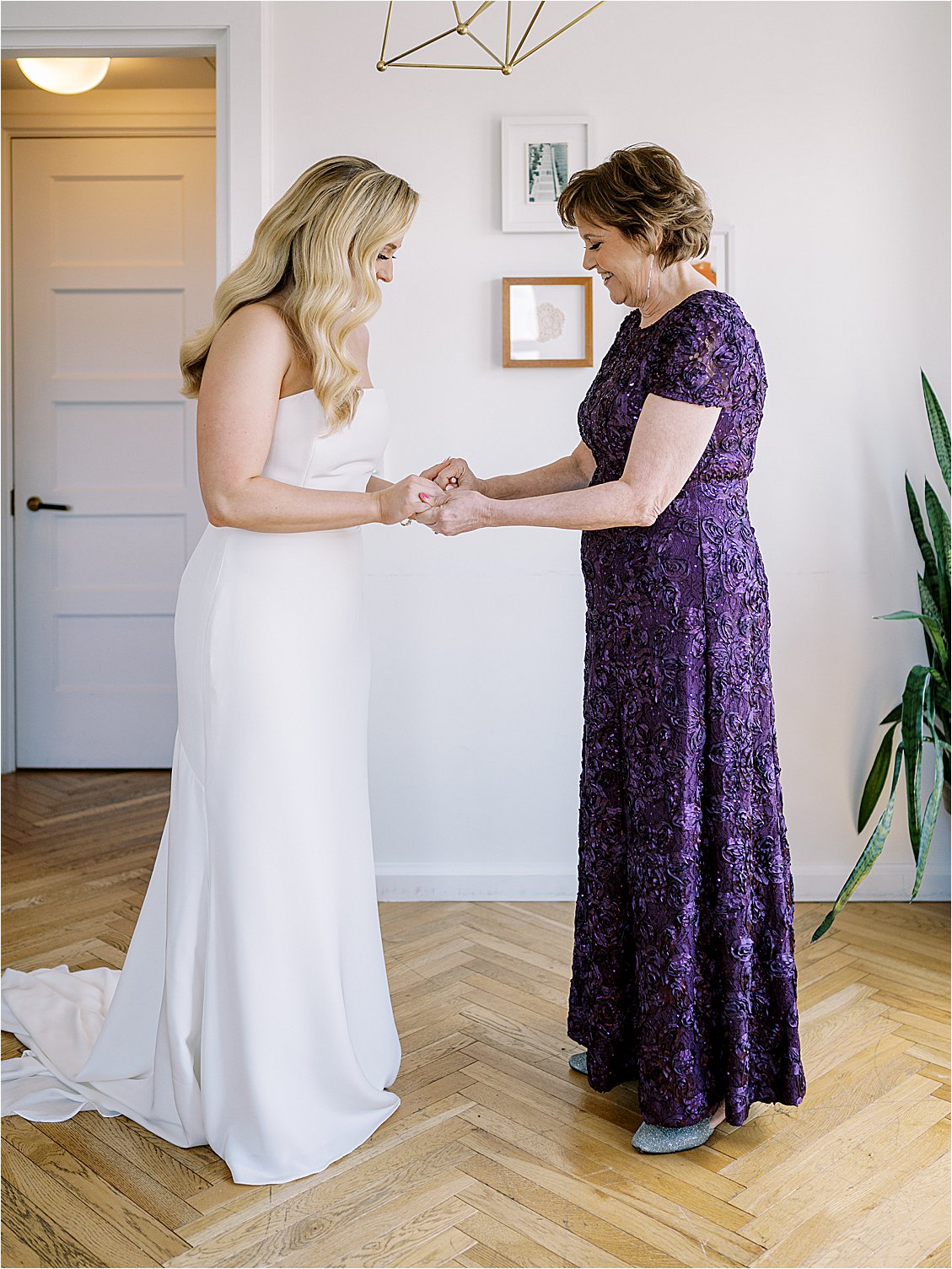 Bride and Mother sharing a moment before she walks down the aisle
