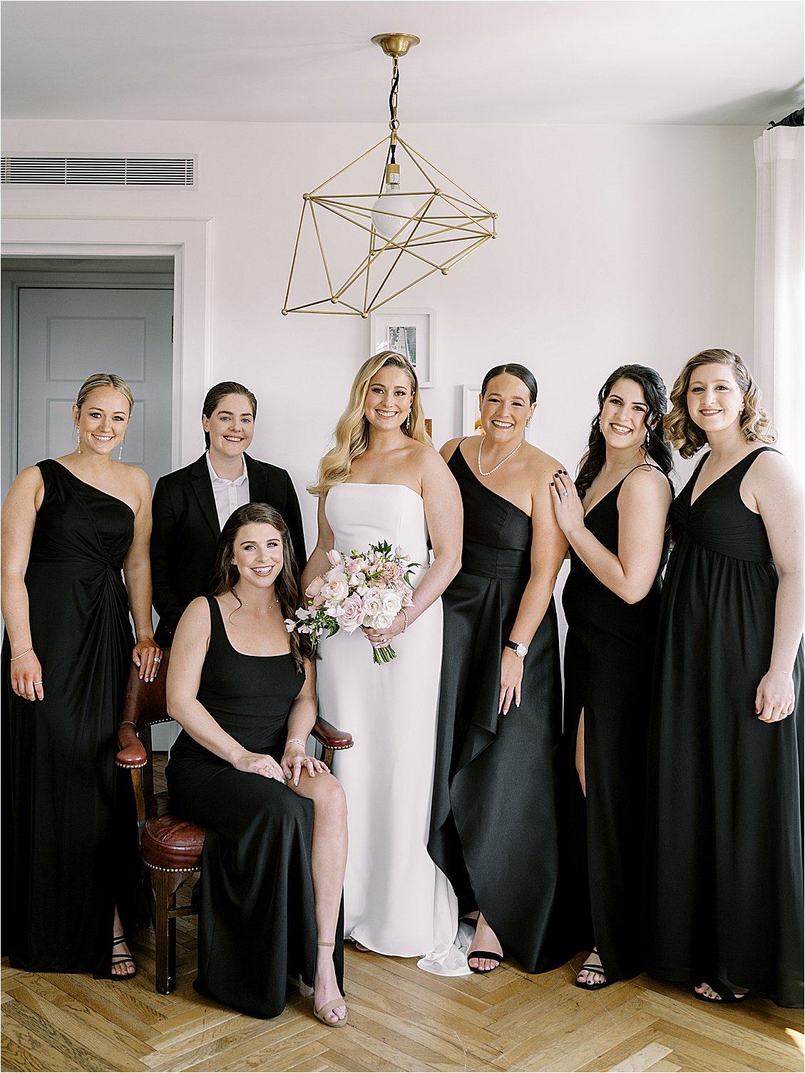 Bride and wedding party in all black at DC Wedding at The Line DC