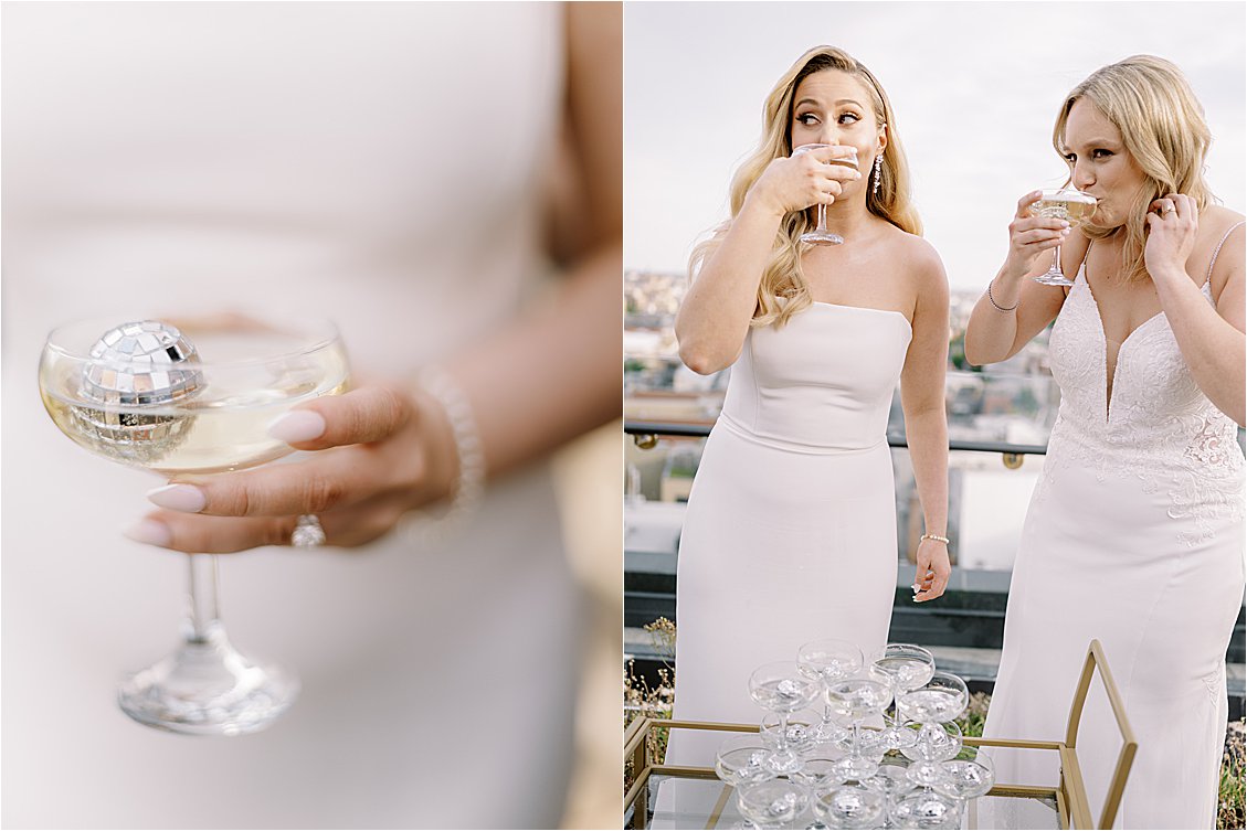 Brides share a mini champagne tower with disco balls at rooftop wedding in Washington DC with film wedding photographer Renee Hollingshead
