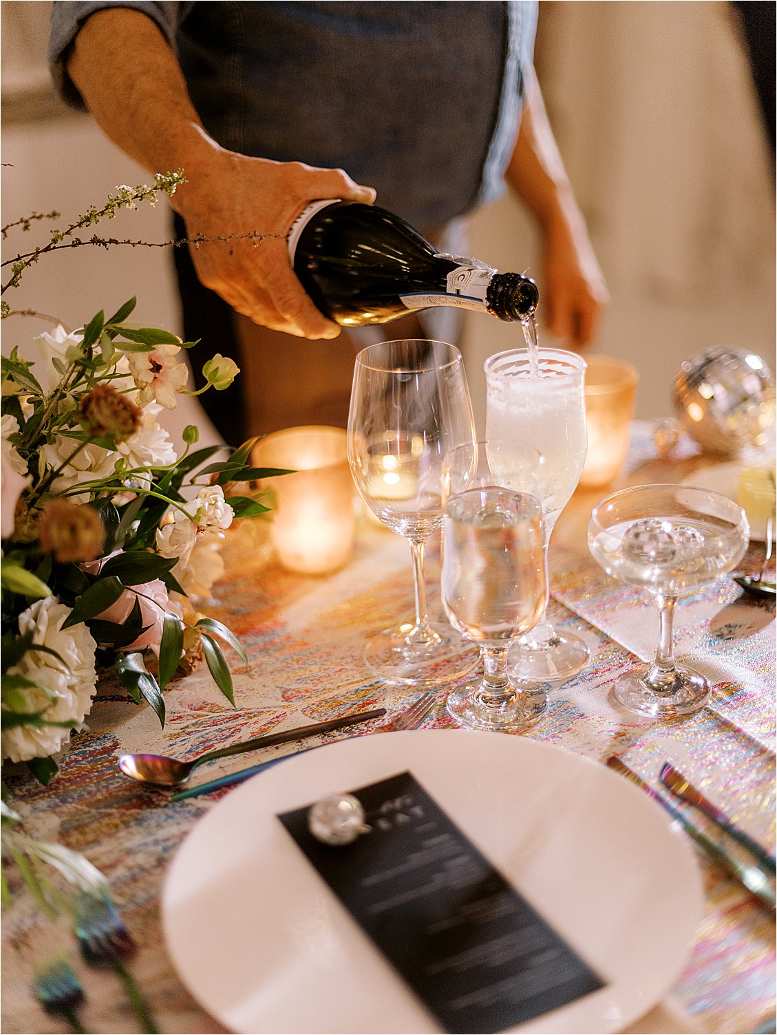 Champagne being poured during wedding reception in Washington DC with film wedding photographer Renee Hollingshead