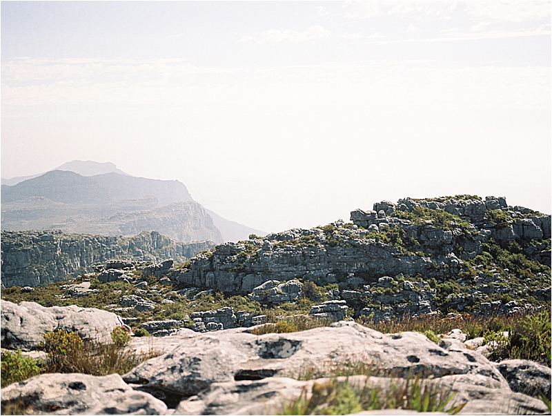 Table Mountain in Cape Town, South Africa with film destination wedding and travel photographer, Renee Hollingshead