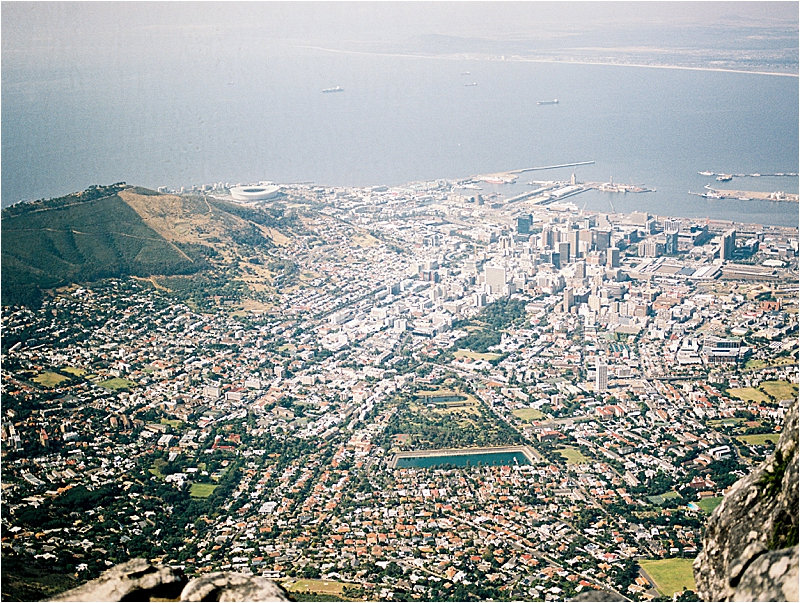 View from above Table Mountain in Cape Town, South Africa with film destination wedding and travel photographer, Renee Hollingshead