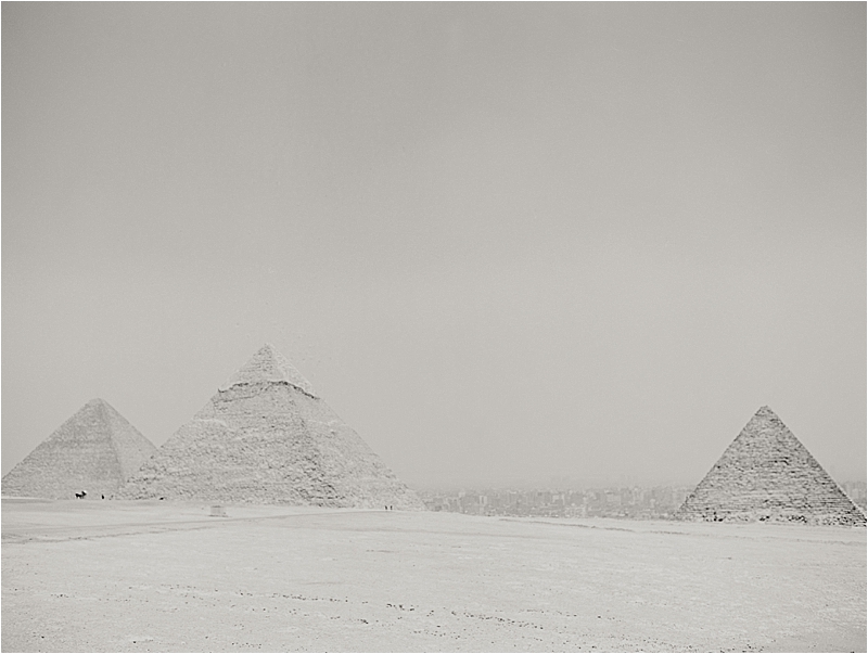 Black and White image of Great Pyramids of Giza by film destination wedding photographer, Renee Hollingshead