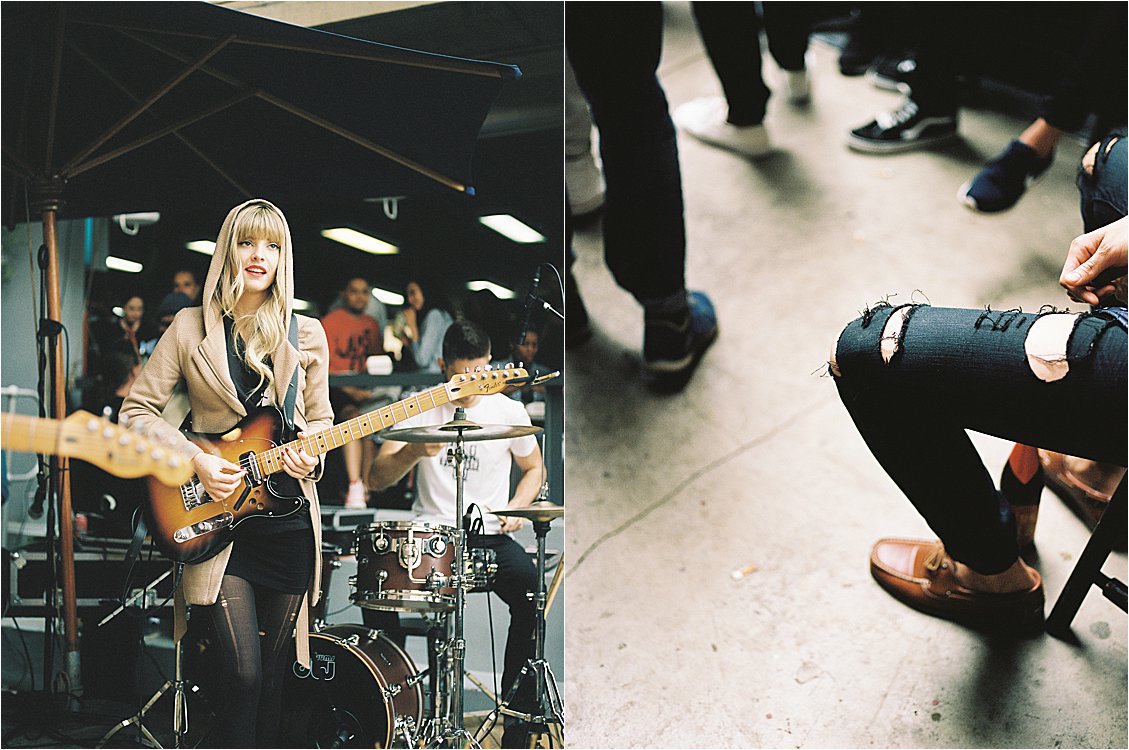 Diptych from Neighbourgoods Market in Johannesburg, South Africa on film — a female guitarist with blonde hair performing live with a Fender electric guitar and a drummer behind her, alongside a street style close-up of a person seated in distressed black jeans and tan leather loafers, photographed by Renee Hollingshead