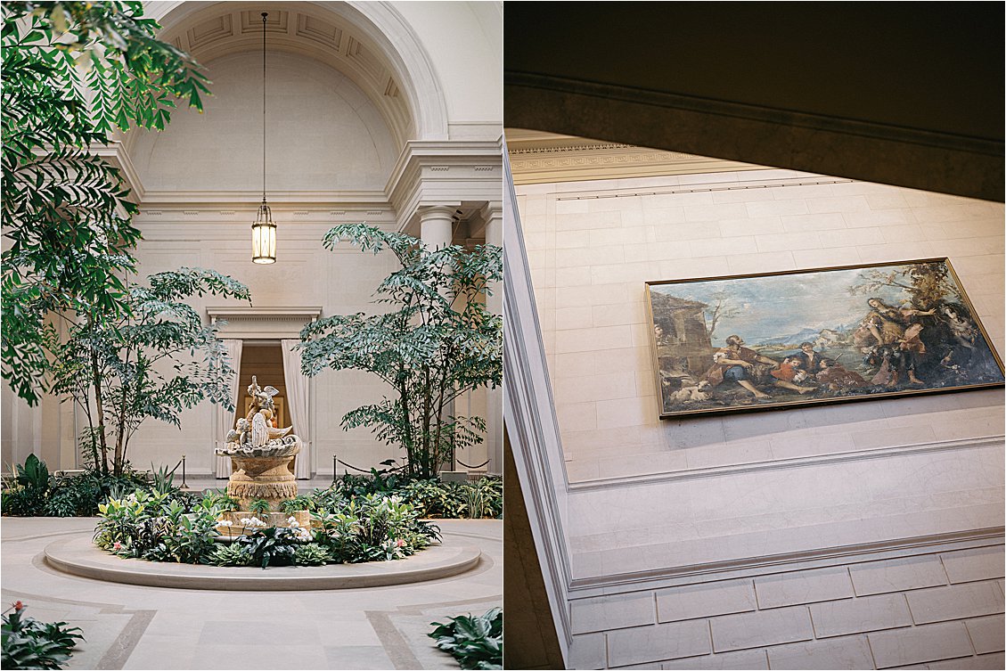 Sunlit indoor courtyard with palm trees and a stone fountain paired with a gold-framed landscape painting, part of a National Gallery of Art photos session. Photo by destination film wedding photographer Renee Hollingshead.